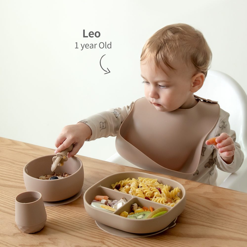 One-year-old eating pasta from a SAMiGO suction plate